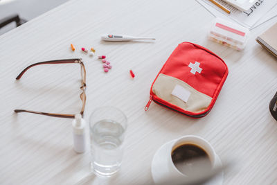 High angle view of personal accessories on table