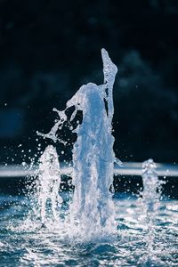 Close-up of water splashing in swimming pool