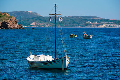 Traditional greek fishing boat in the aegean sea, greece.