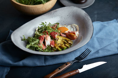 High angle view of vegetables in bowl on table