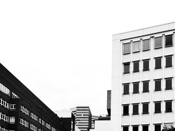 Low angle view of buildings against clear sky