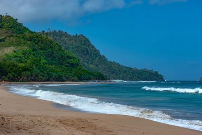 Scenic view of beach against sky