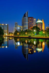 Reflection of illuminated buildings in water