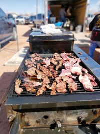 Close-up of meat on barbecue grill