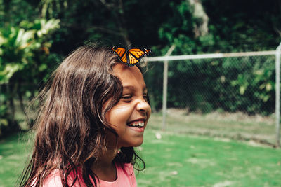 Smiling girl looking away