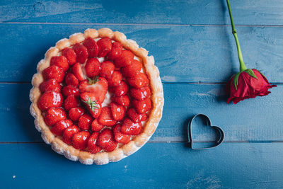 High angle view of strawberries on table