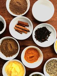 High angle view of spices in bowls on table