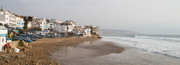 Scenic view of beach against clear sky