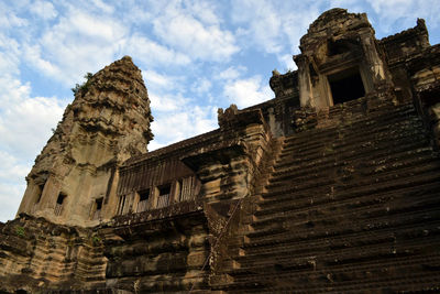 Low angle view of old historic building against sky