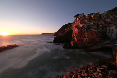 Scenic view of sea against sky during sunset