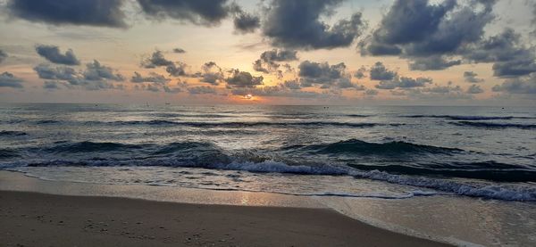 Scenic view of sea against sky during sunset