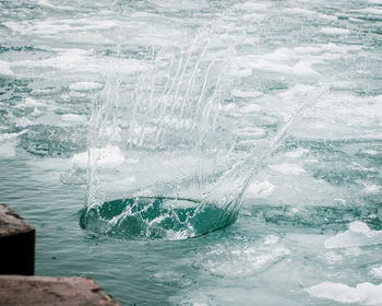 Close-up of water splashing in swimming pool