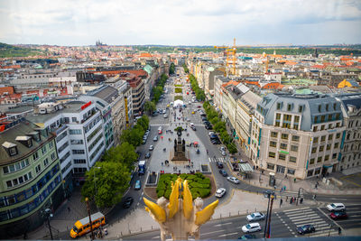 High angle view of street amidst buildings in city