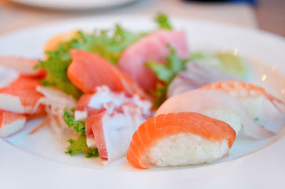 Close-up of sushi served in plate on table