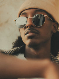 Portrait of young man wearing sunglasses