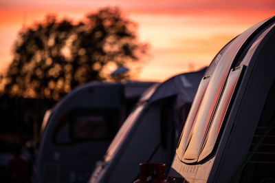 Close up of caravan against sunset