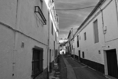 Narrow alley along buildings