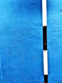 High section of blue wall