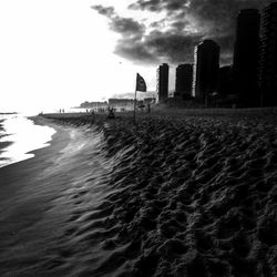 View of sea with buildings in background