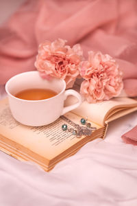 High angle view of pink roses on table