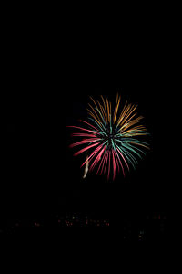 Firework display at night