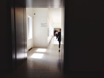 Full length of woman in corridor