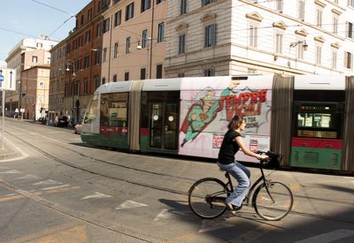 Man riding bicycle on road