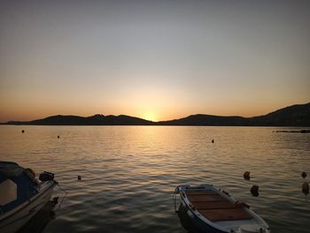 Scenic view of sea against clear sky during sunset