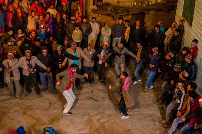 High angle view of people standing outdoors