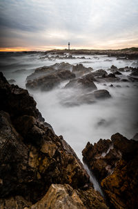 Scenic view of sea against sky during sunset