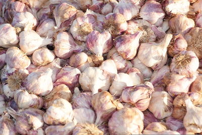 Full frame shot of onions for sale at market stall
