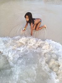 Full length of woman on beach