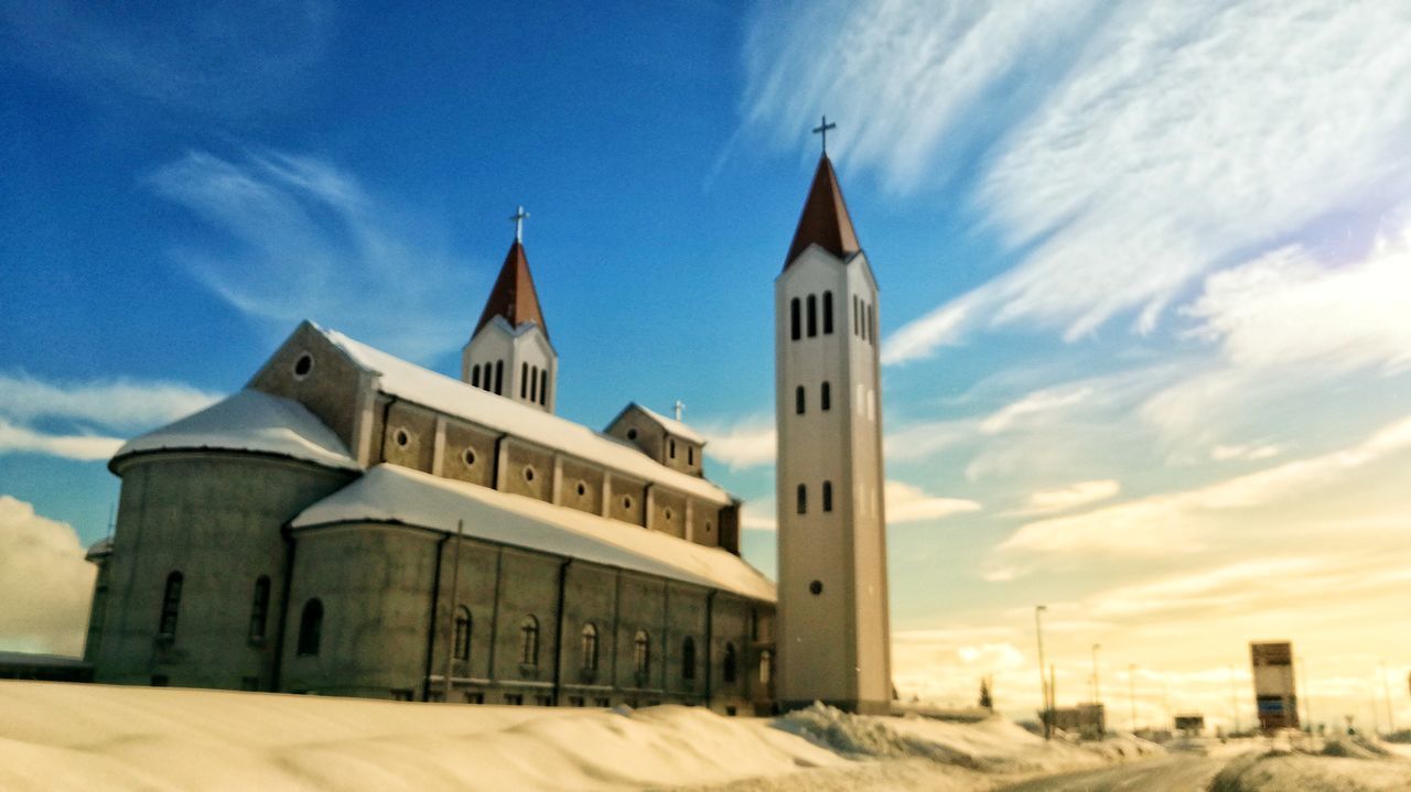 BUILDINGS AGAINST SKY