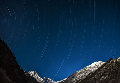 Low angle view of star field against sky at night