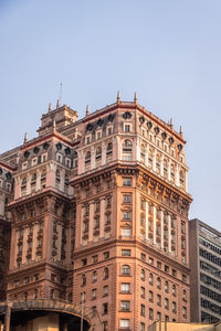 Low angle view of historic building against clear sky