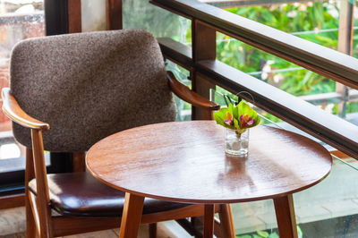 Close-up of empty chairs and table at home