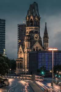 View of illuminated cathedral against sky at night