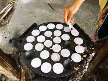 High angle view of man preparing food