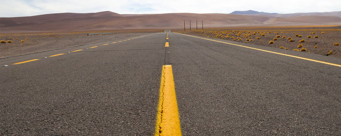 Scenic view of desert road against sky atacama chile desert