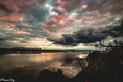 Scenic view of sea against sky at dusk