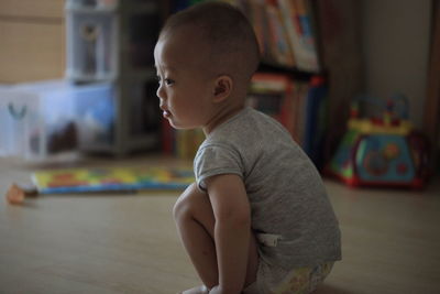 Side view of boy looking at home