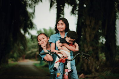 Happy mother and son on tree