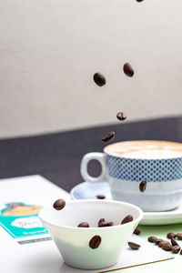 High angle view of coffee cup on table