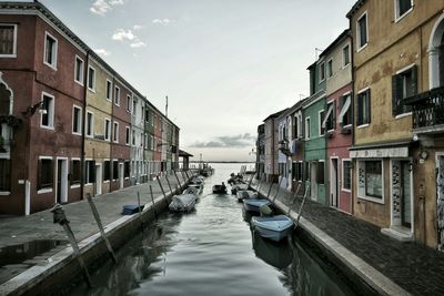 View of canal along buildings