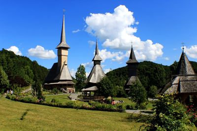 Panoramic view of temple against blue sky