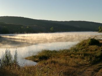 Scenic view of landscape against clear sky