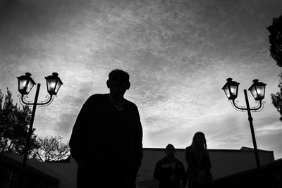 Silhouette man against sky