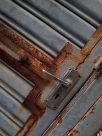 Close-up of rusty metal door