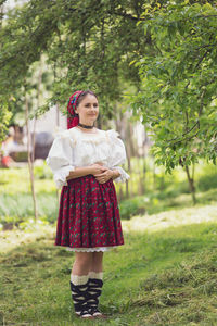 Woman standing on field