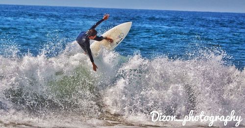 Man surfing in sea